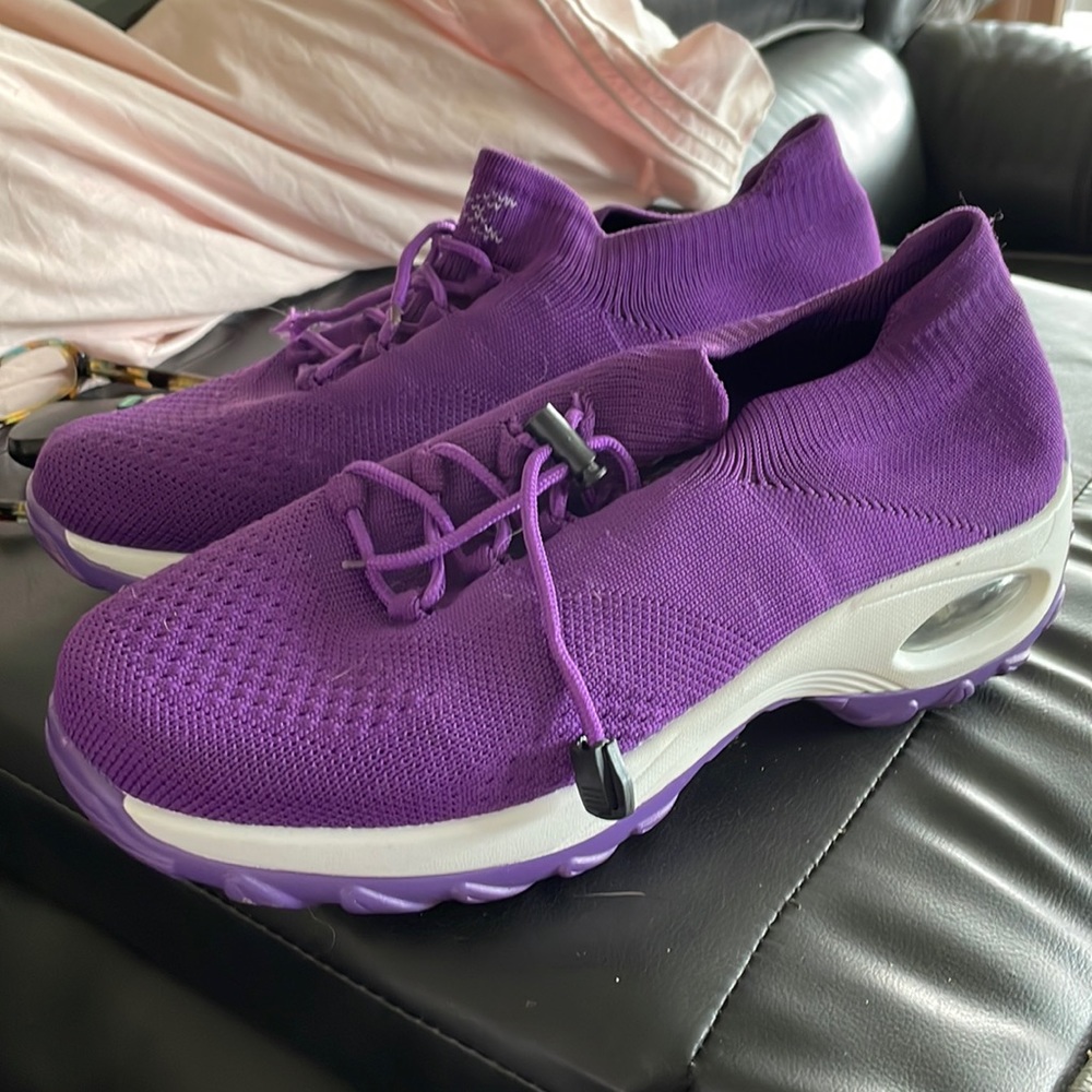 Woman’s purple, size 11, bought on Amazon. Gently used